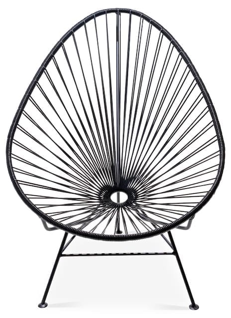 Black wire Acapulco chair with an open, geometric design, showcasing a unique teardrop shape.