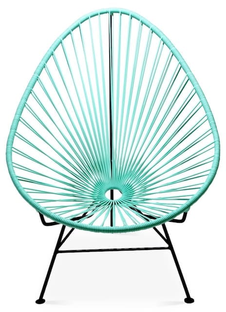 A modern turquoise Acapulco chair with a geometric design and black metal legs, showcasing a stylish outdoor seating option.