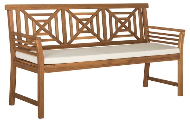 Wooden outdoor bench with a geometric backrest design and a white cushion, suitable for modern outdoor living spaces.