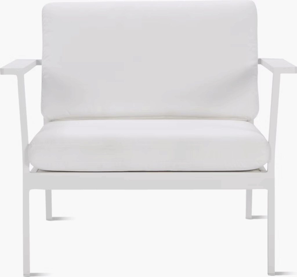 Modern white outdoor lounge chair with thick cushions and a minimalist design.