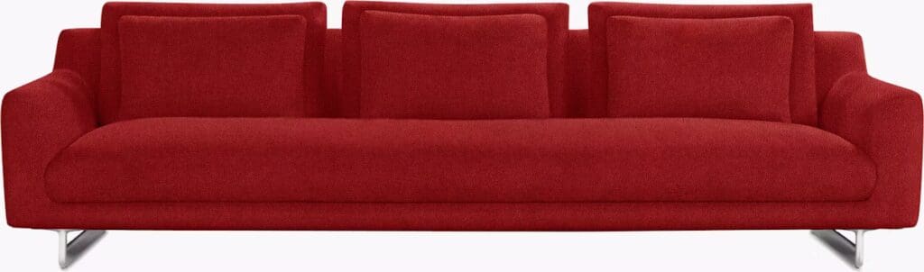 Stylish red sofa with three cushions and sleek metal legs.