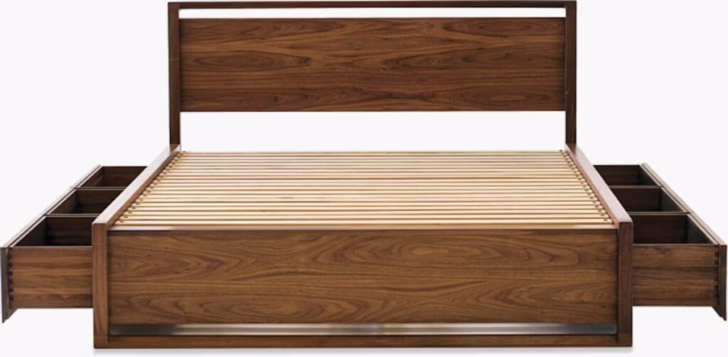 Modern wooden bed frame with a slatted base and built-in storage drawers on both sides.
