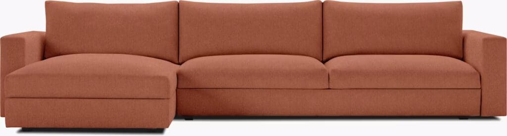 A modern brown sectional sofa with clean lines and a minimalist design.