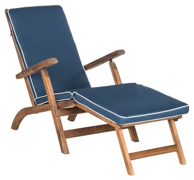 A wooden reclining lounge chair with navy blue cushion and white piping, designed for outdoor use.
