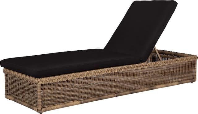 A lounger with a black cushion and woven rattan base, designed for outdoor relaxation.
