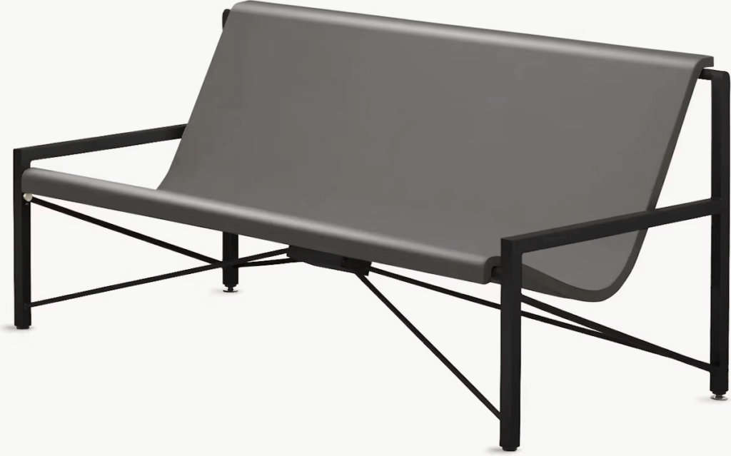 Modern minimalist outdoor sofa with a grey seat and black frame.