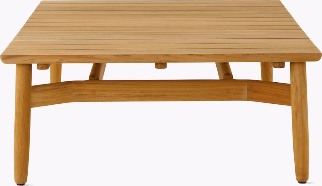 A square wooden coffee table with a slatted top and sturdy legs.