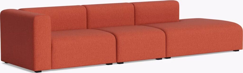 A modern orange sectional sofa with a minimalist design, featuring soft upholstery and clean lines.