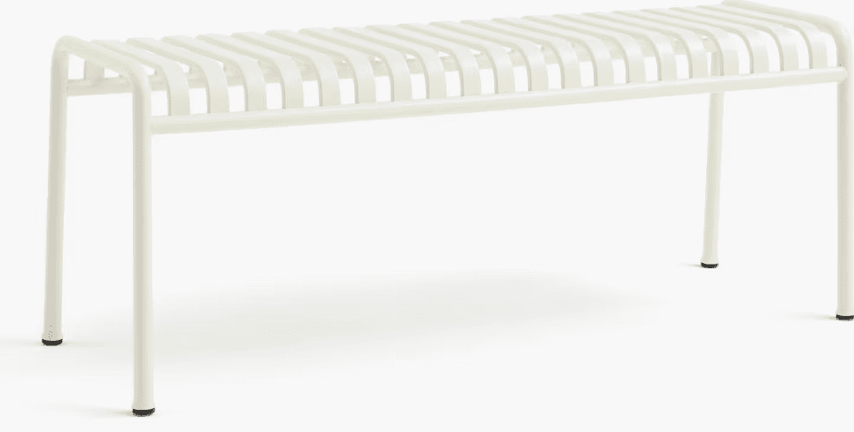 Modern white outdoor bench with slatted design and curved legs.