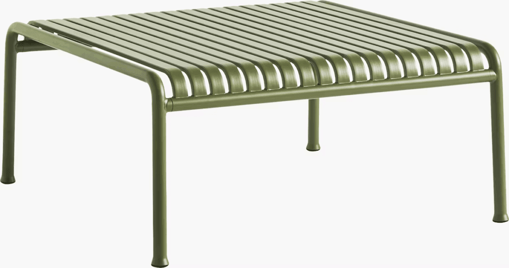 Green metal coffee table with a slatted design, suitable for outdoor settings.
