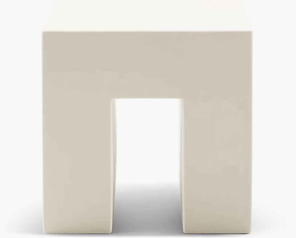 Contemporary white side table with a minimalist design.