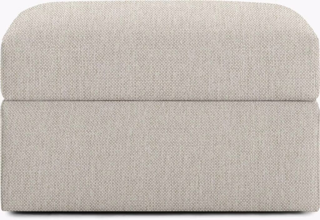Close-up view of a beige upholstered cushion, showcasing a textured fabric design.