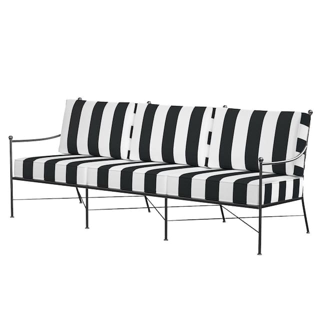 Modern outdoor sofa with black and white striped cushions and a sleek metal frame, ideal for stylish exterior spaces.
