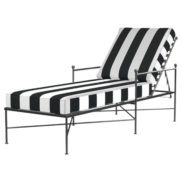 Modern outdoor chaise lounge with a black and white striped cushion, featuring a sleek metal frame, suitable for relaxation by the pool or garden.