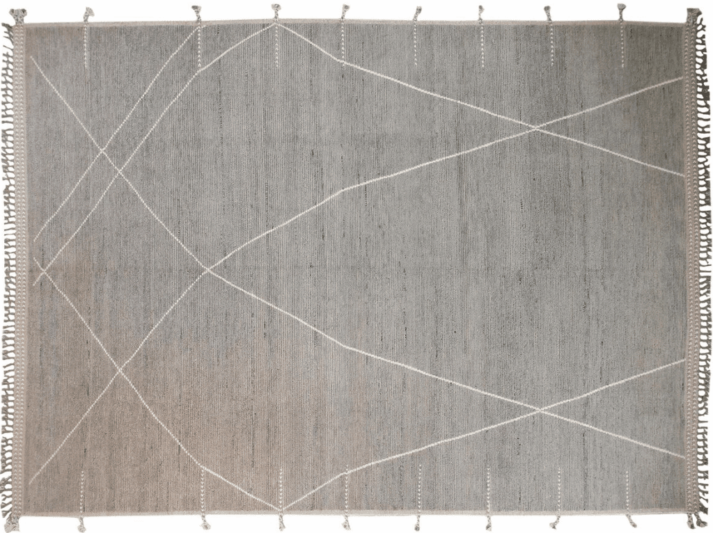A modern gray and white woven rug featuring an abstract crisscross pattern, with fringes along the edges.