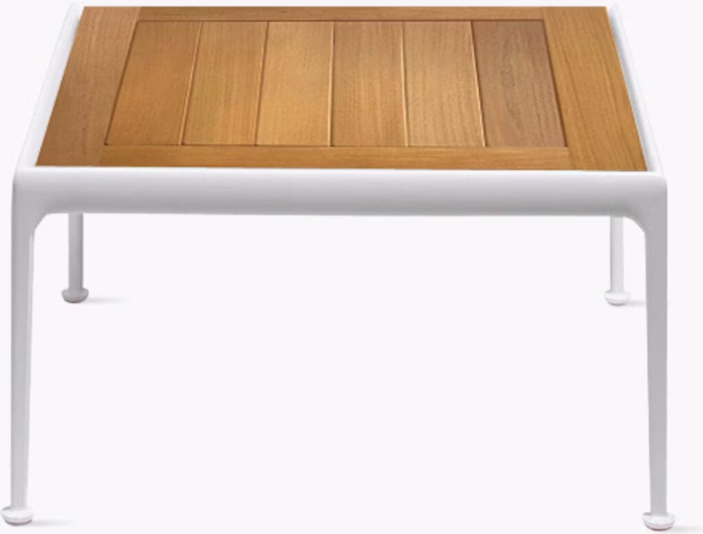 A modern low coffee table featuring a wooden top with slatted design and white metal legs.