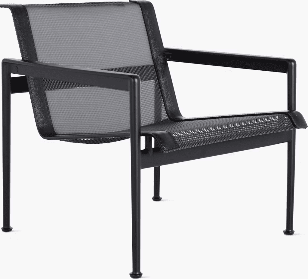 Modern outdoor lounge chair featuring a black mesh design with a streamlined frame.