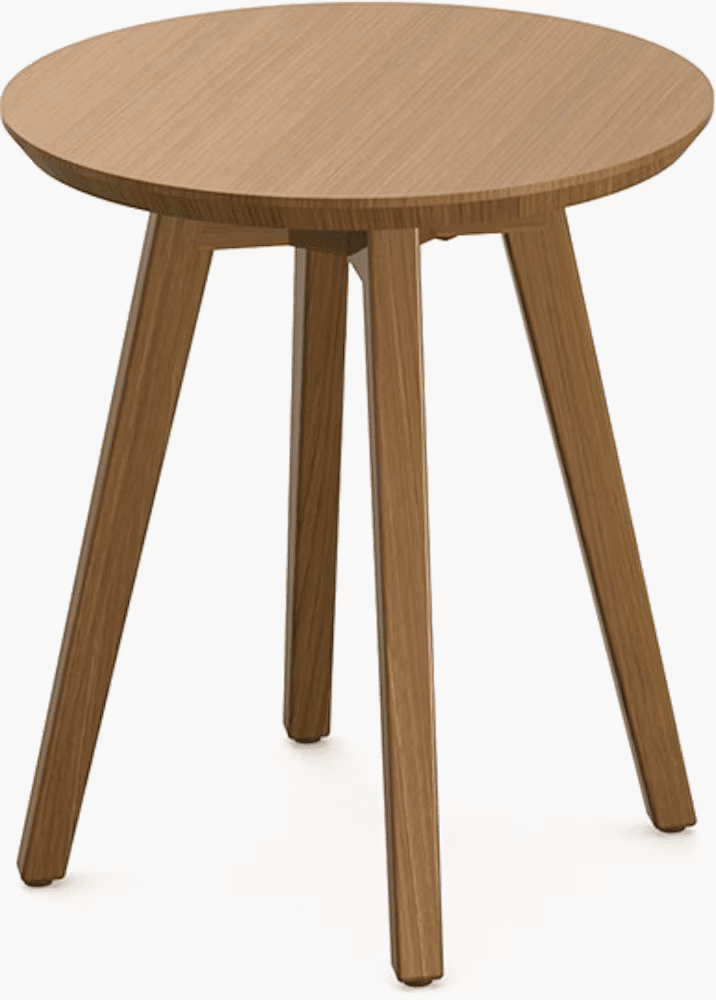 Wooden side table with a round top and three tapered legs.