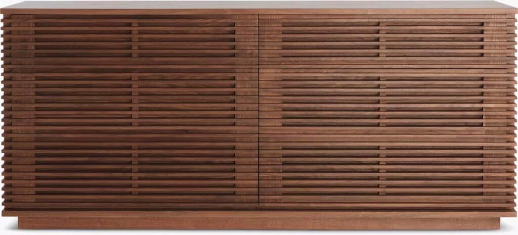 A modern wooden sideboard featuring a slatted design, with a rich walnut finish and a smooth top surface.
