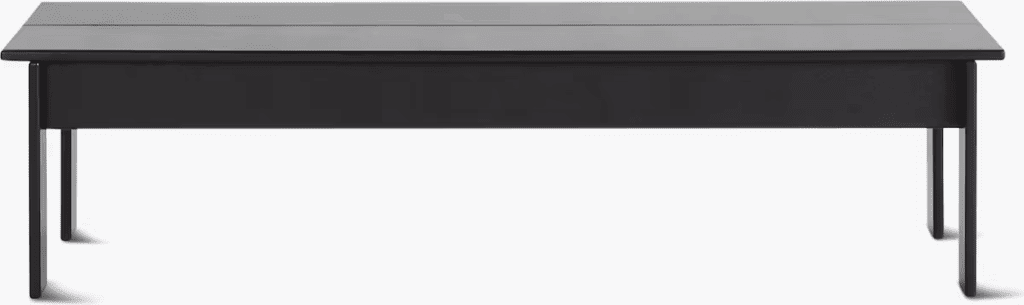 Modern black rectangular coffee table with sleek design and straight legs.