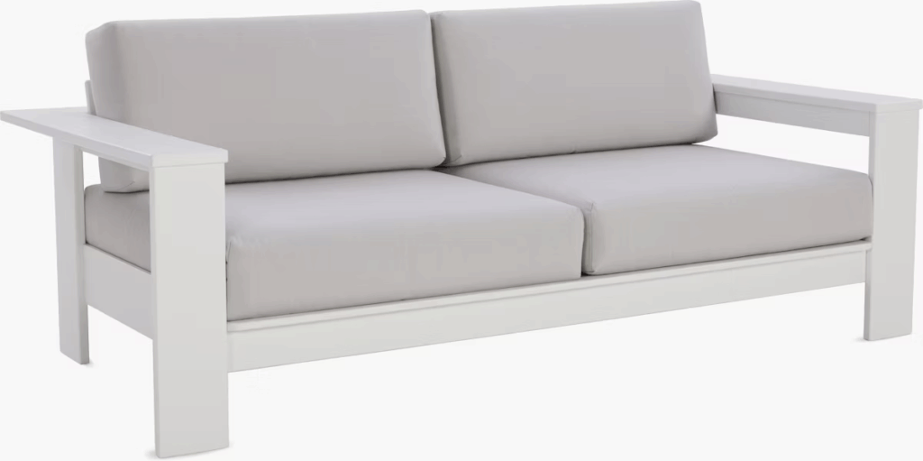 Modern outdoor loveseat with a white frame and light gray cushions, designed for comfort and style.