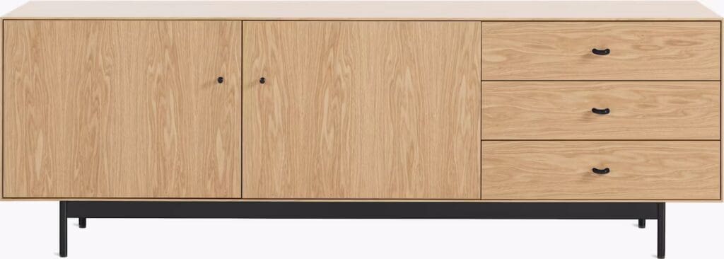 A modern wooden sideboard with two cabinets and three drawers, featuring a natural wood finish and black metal legs.