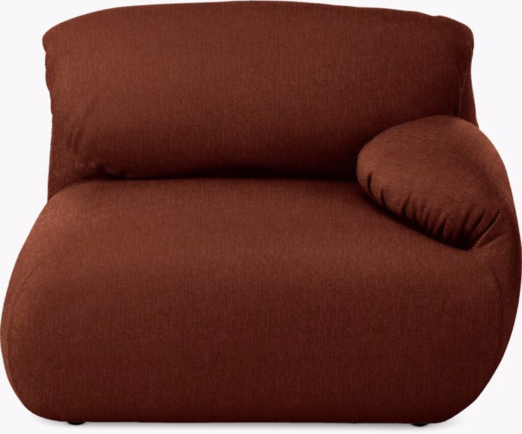 A modern brown chaise lounge sofa with a plush design and a rounded, cozy armrest.