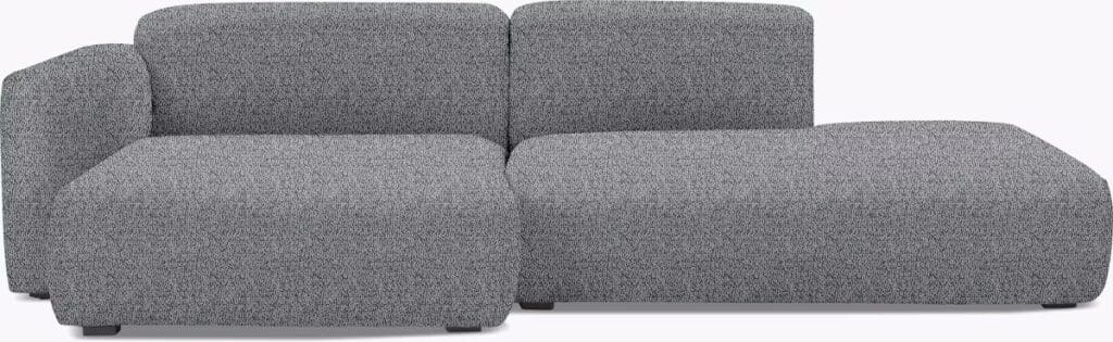A modern sectional sofa in a gray fabric with clean lines and a minimalist design.