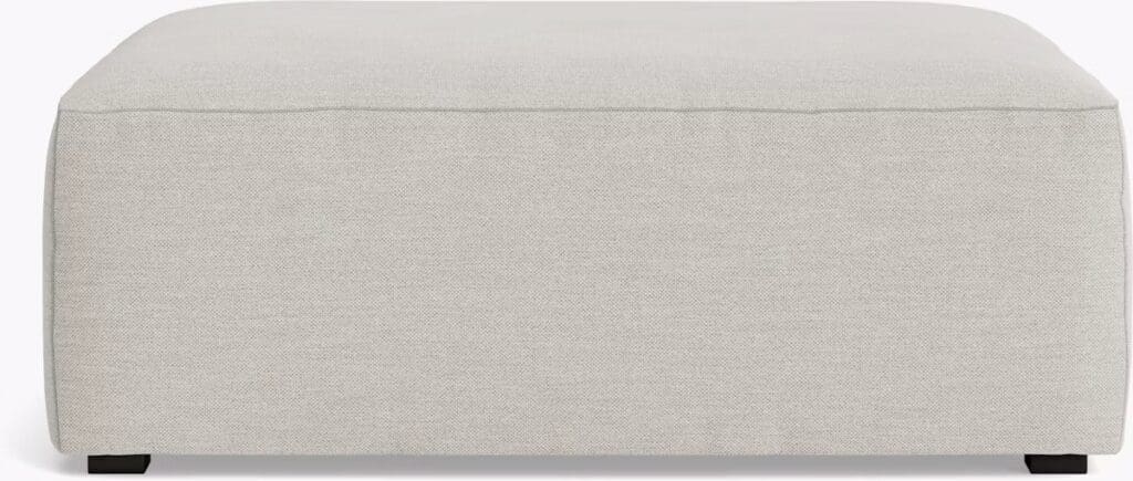 Light gray upholstered ottoman with a simple design and dark wooden legs.