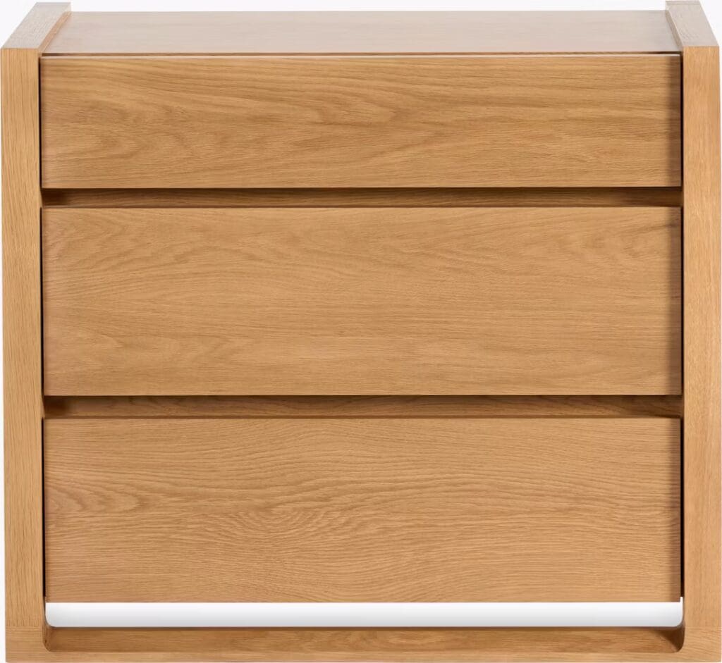 A modern wooden nightstand with three drawers, featuring a smooth finish and minimalist design.