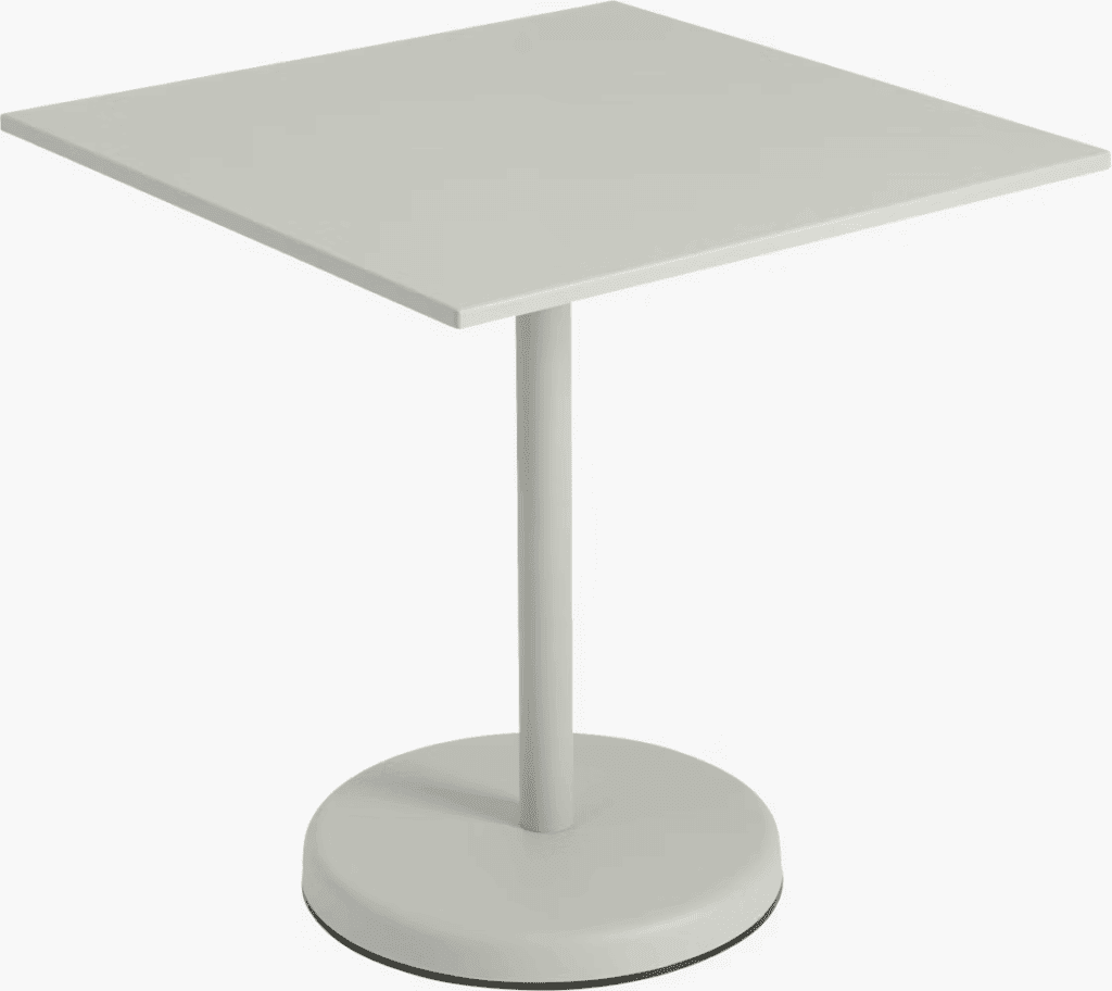 Minimalist modern side table with a square top and round base in a light color.