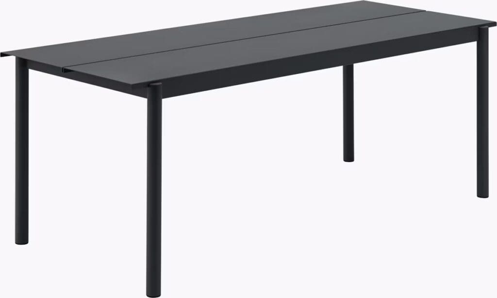 A modern black dining table with a minimalist design, featuring a simple rectangular shape and slender legs.