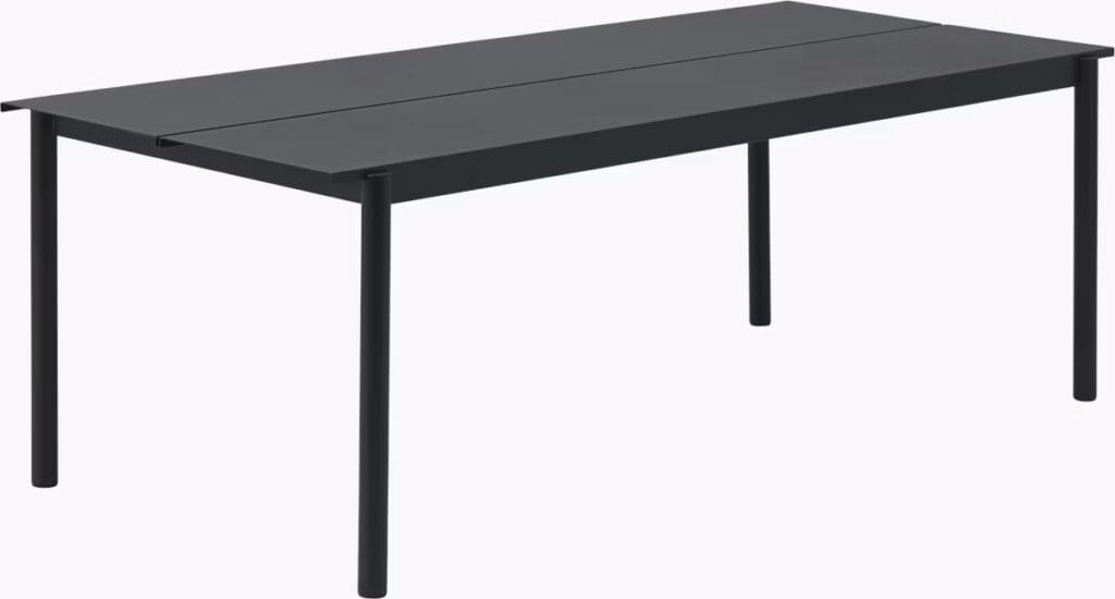 A sleek rectangular black dining table with a minimalist design, featuring a smooth top and slender legs.