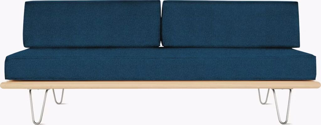 A modern blue sofa with a minimalist design featuring two back cushions and a wooden base with metal legs.