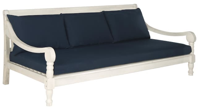 Elegant white outdoor sofa with navy blue cushions, designed for comfort and style.