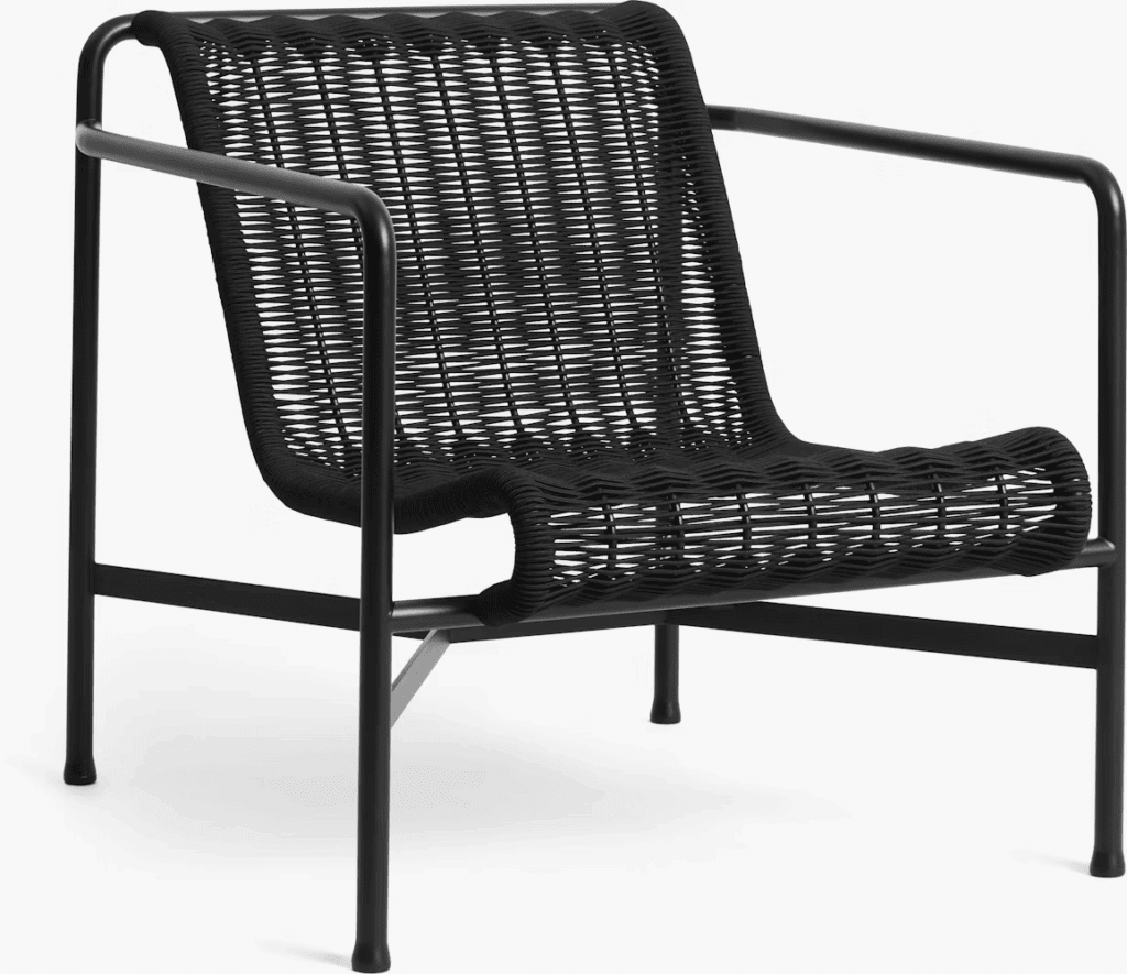 Black woven outdoor chair with a minimalist metal frame, designed for luxurious outdoor living.