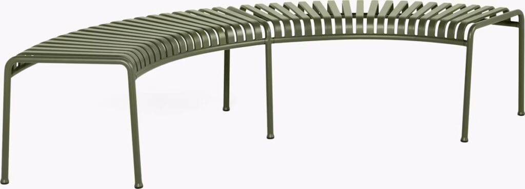 A modern curved bench made of metal slats, featuring a green finish, designed for outdoor use.
