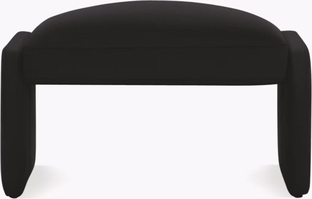 A black upholstered bench with rounded edges, featuring a minimalist design.