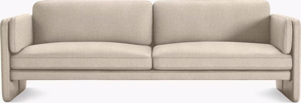 A modern beige sofa with clean lines and a minimalist design, featuring high armrests and comfortable cushions.