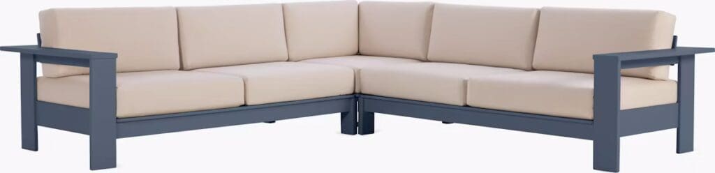 Modern outdoor corner sofa in light beige upholstery with a dark gray frame, designed for luxurious seating.