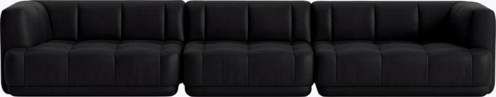 A modern black sectional sofa with tufted cushions and a sleek design, ideal for contemporary living spaces.