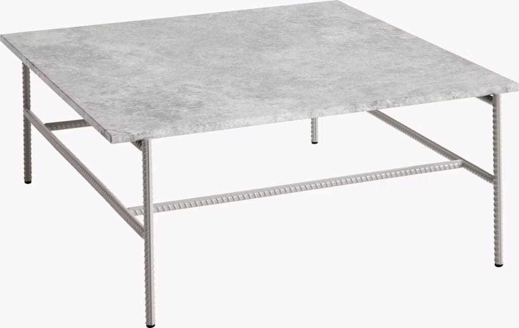A modern square coffee table with a textured gray top and metal base featuring a rebar design.