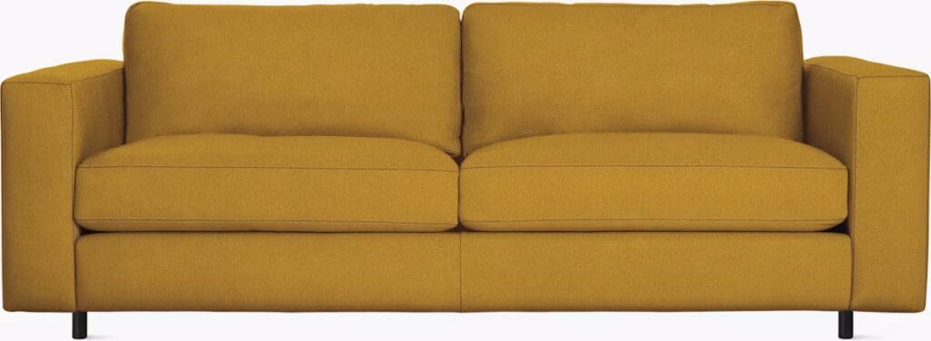 A modern yellow sofa with two plush cushions and a minimalist design, featuring square arms and slender black legs.