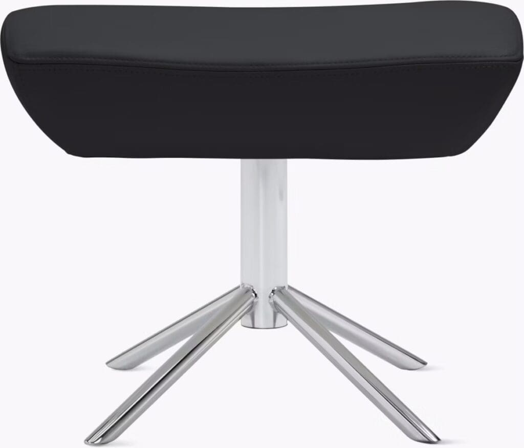 A modern black chair with a sleek chrome base, featuring a minimalist design and a rounded backrest.