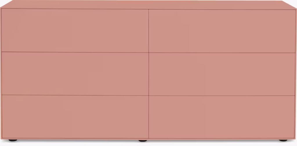 Modern six-drawer dresser in a soft pink finish.