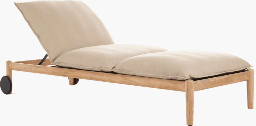 Modern outdoor chaise lounge chair with a light beige cushion and natural wood frame.