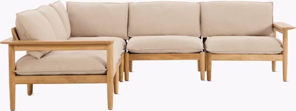 Modern outdoor sectional sofa with light beige cushions and wooden frame, designed for comfort and style.
