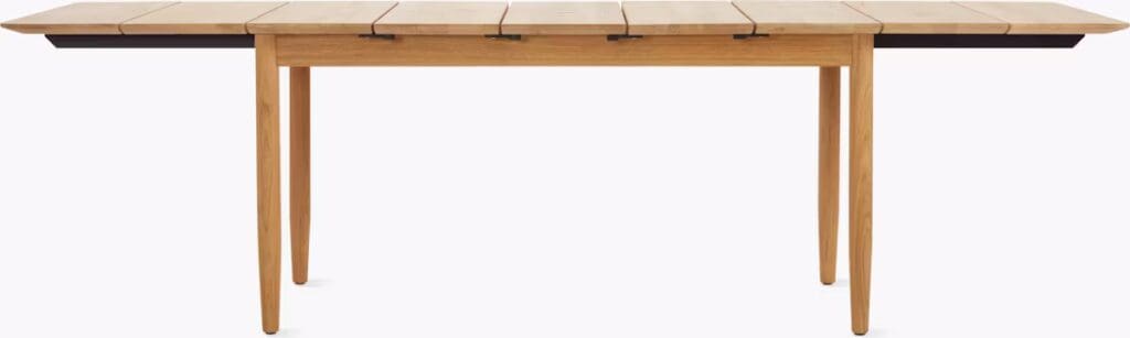 A modern wooden dining table with extendable sides and sleek legs.