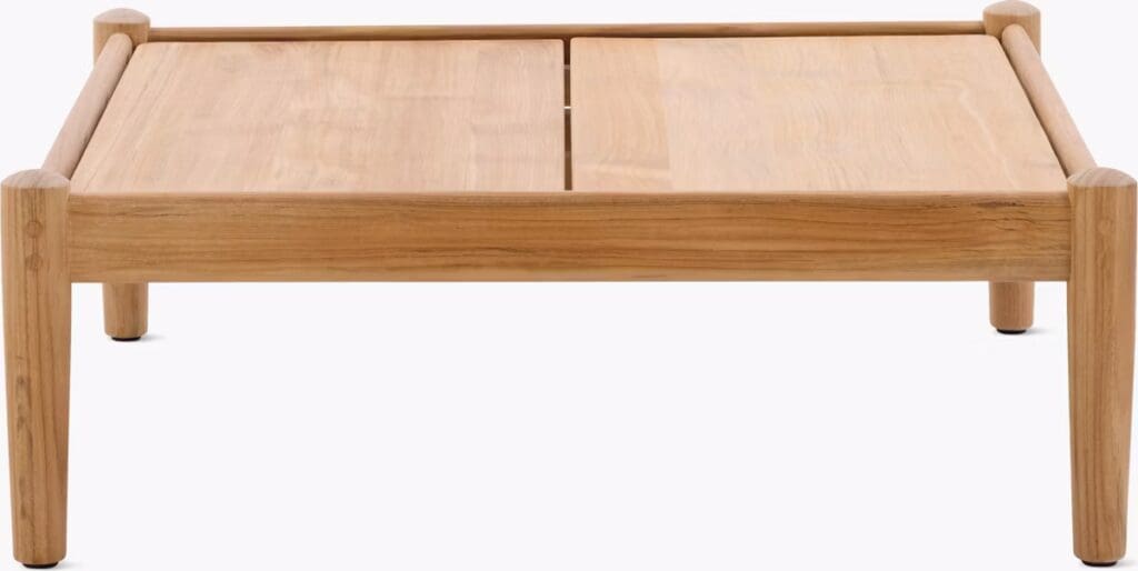 A minimalistic wooden coffee table with a smooth surface and rounded legs, showcasing natural wood grain.