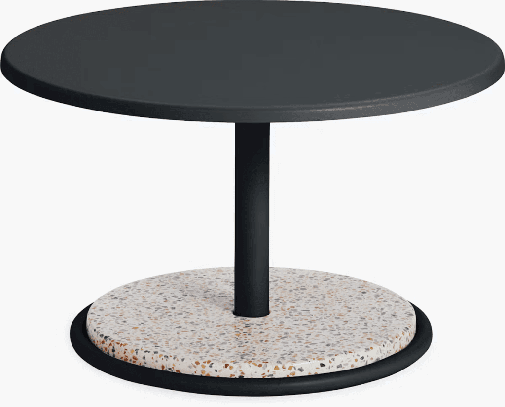Modern round outdoor table with a sleek black top and a textured stone base.